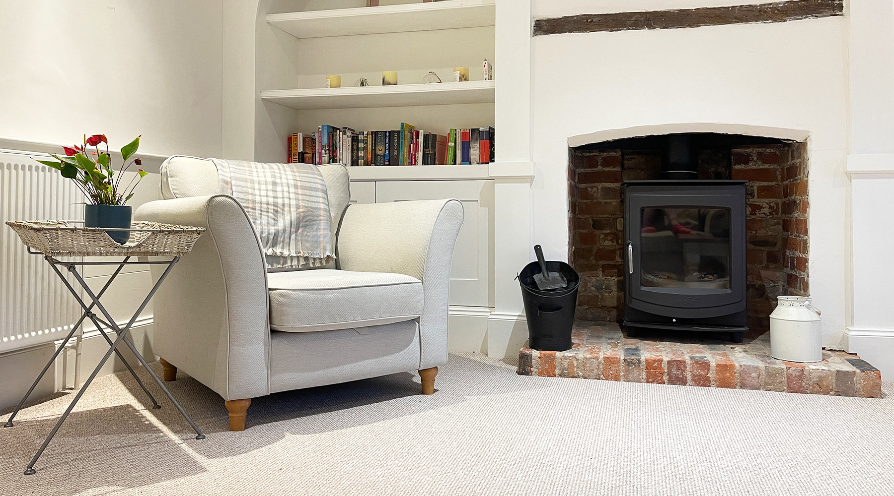 Single upholstered reading chair and fire place