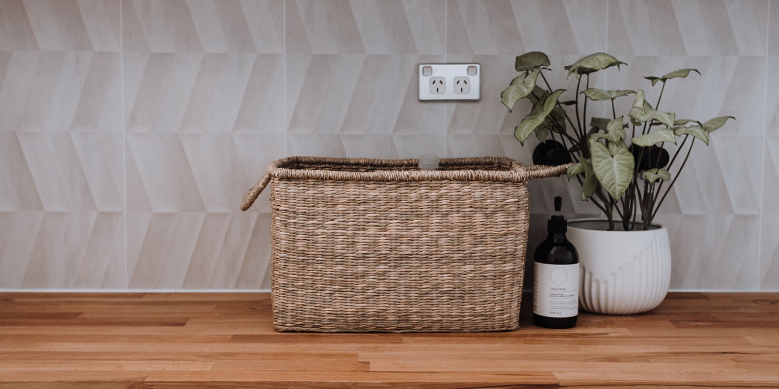 Utility worktop with refill bottle and basket